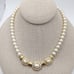1980s Vintage Trifari Simulated Pearl Necklace with Clear Rhinestones Gold Tone
