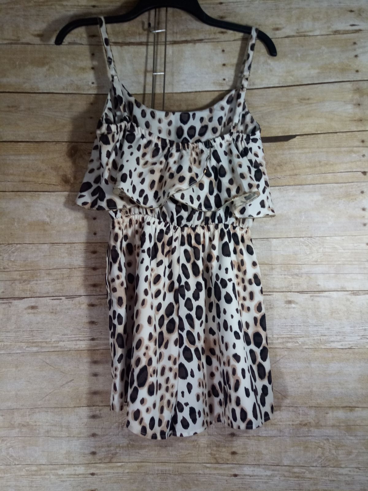 bebe cheetah print romper with gold trim