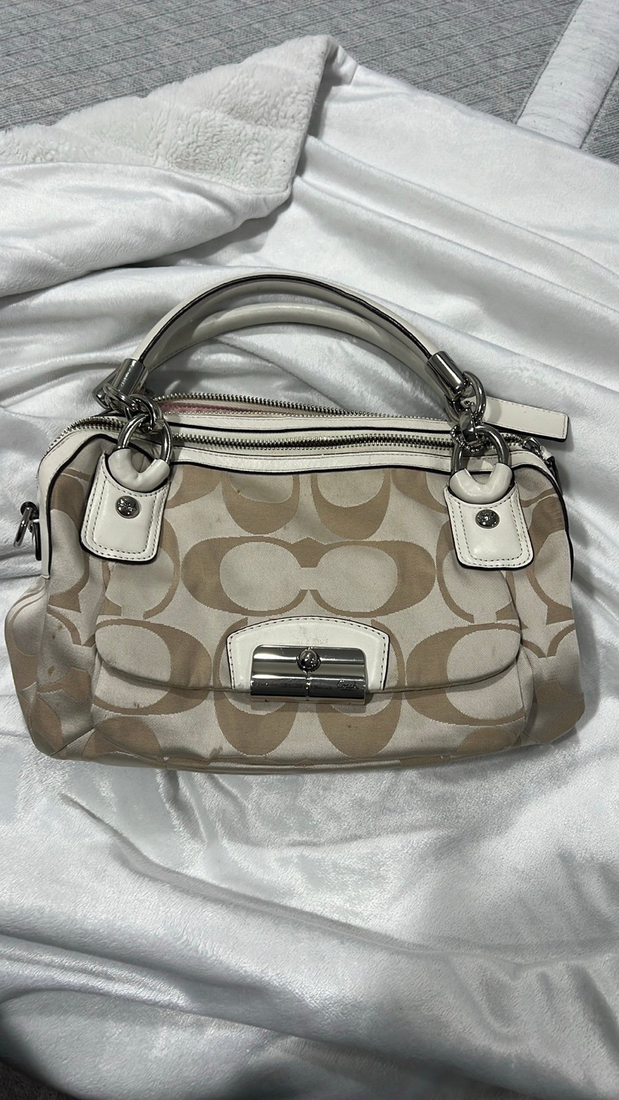 Beige Coach handbag purse