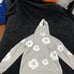 Grey denim tear size medium