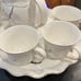 8 Piece China Tea Serving Set. Cups pitcher and raised tray for serving