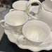 8 Piece China Tea Serving Set. Cups pitcher and raised tray for serving