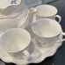 8 Piece China Tea Serving Set. Cups pitcher and raised tray for serving