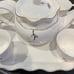 8 Piece China Tea Serving Set. Cups pitcher and raised tray for serving