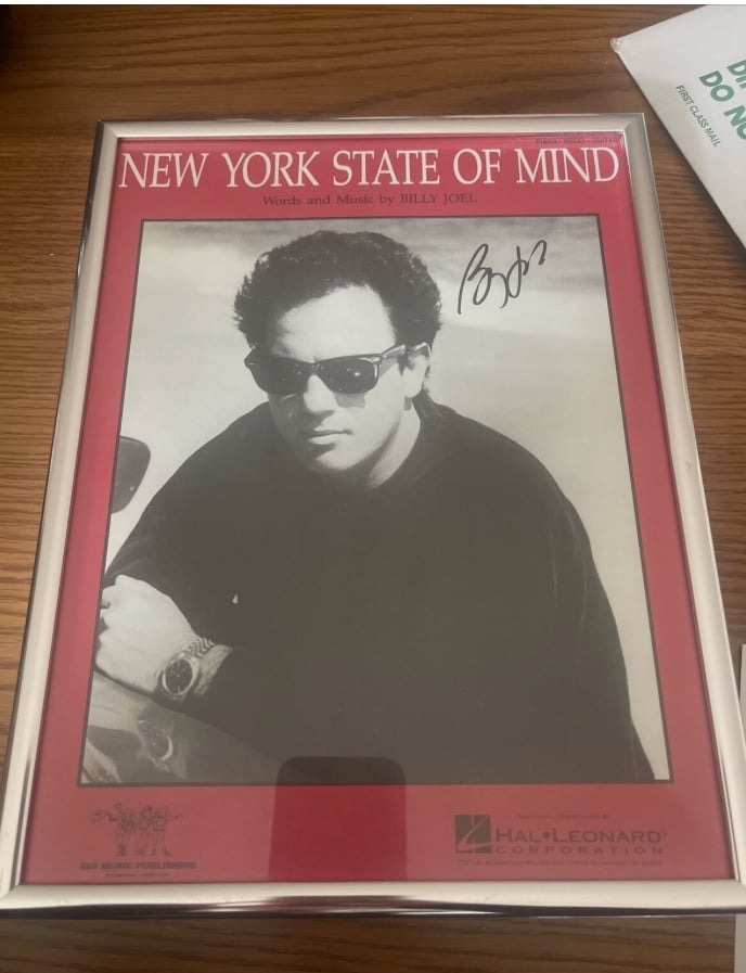 Autographed photo of Billy Joel with COA