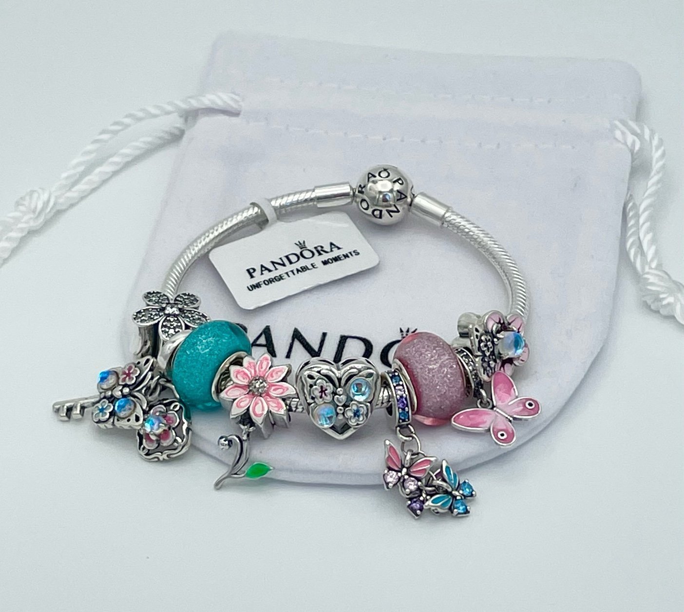 Pandora Bracelet with Turquoise Pink and Silver Themed Charms