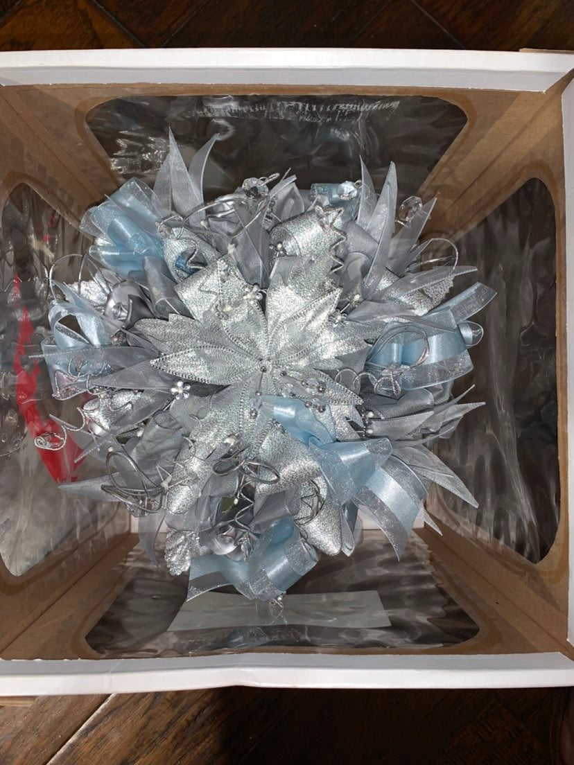 Silver Quinceanera bouquet with blue ribbon