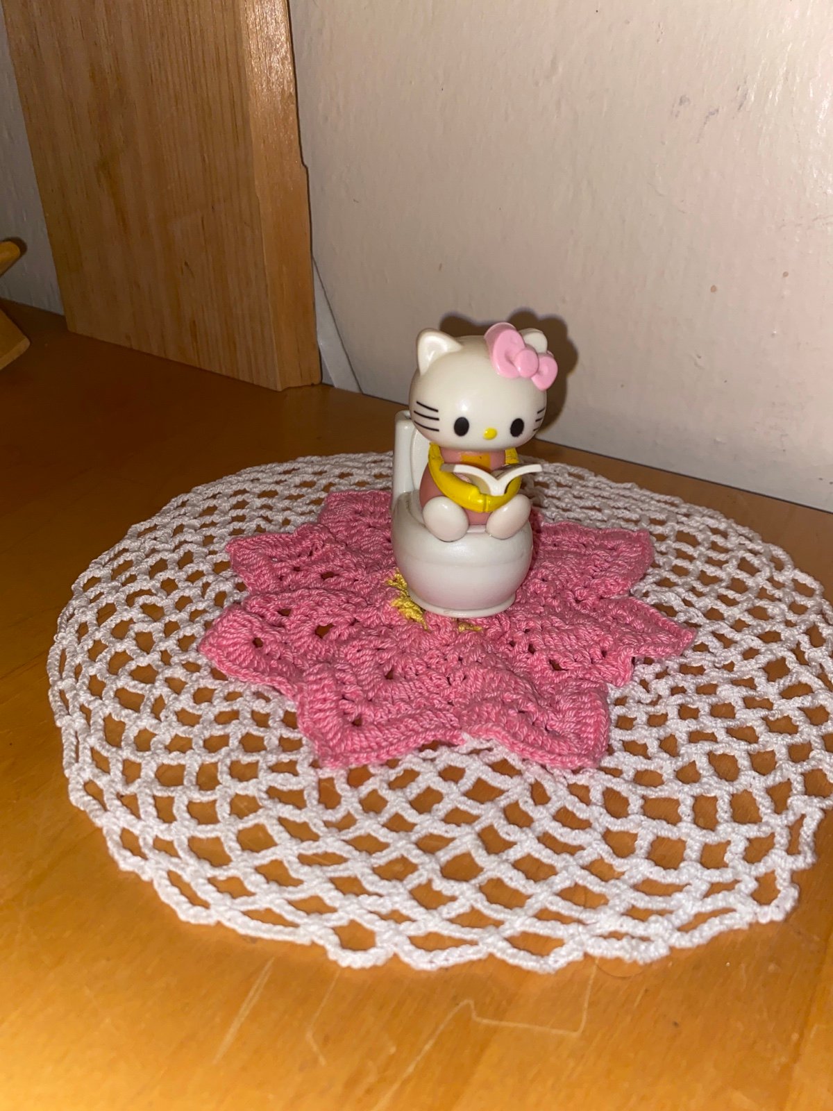 Hello kitty on a toilet figure