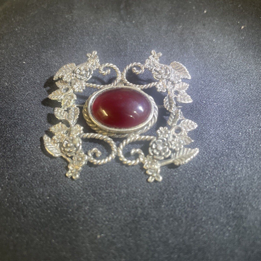 Mexican Signed Antigua Sterling silver Garnet Floral Cutout pendant/brooch