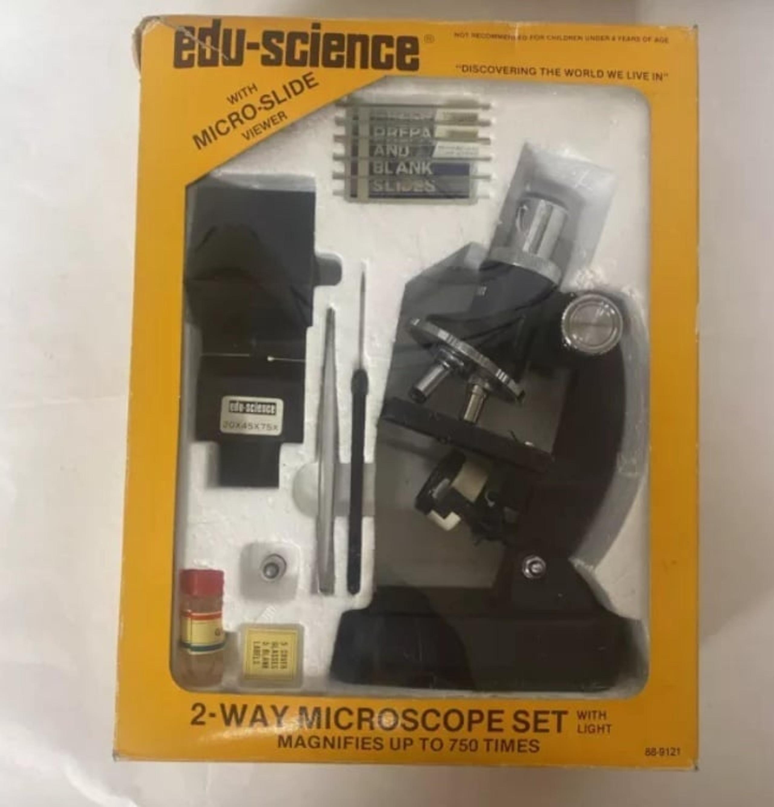 Vintage Edu Science 2 Way Microscope Set With Light. Box has some damage. Batter