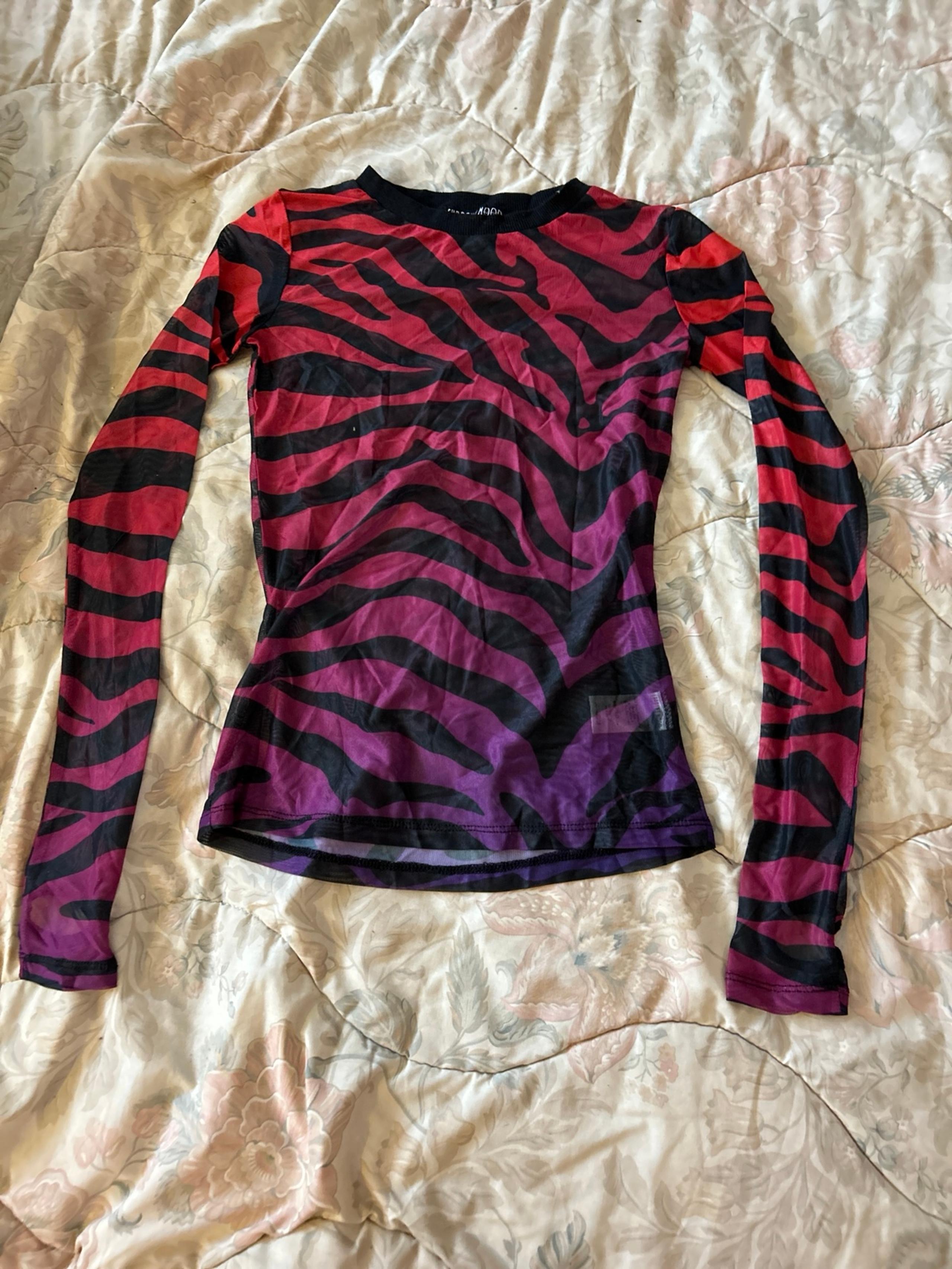 Dolls Kill rainbow mesh thumbhole top