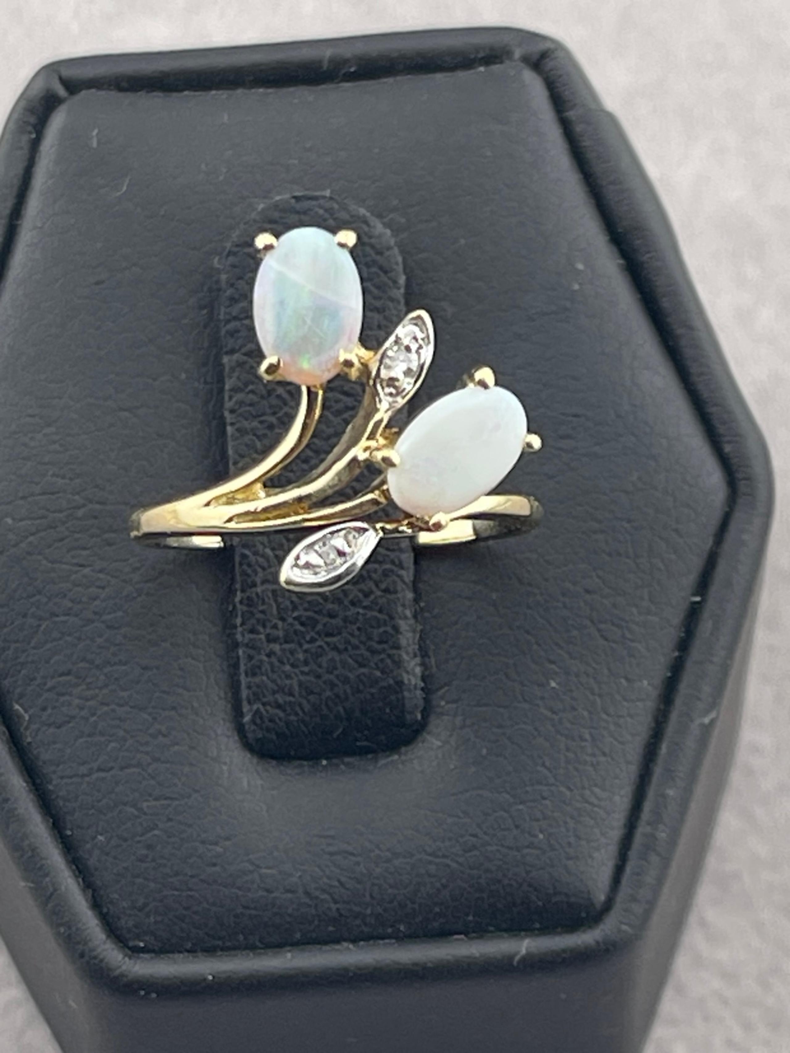 Vintage unique opal and diamond bypass ring 14 karat yellow gold
