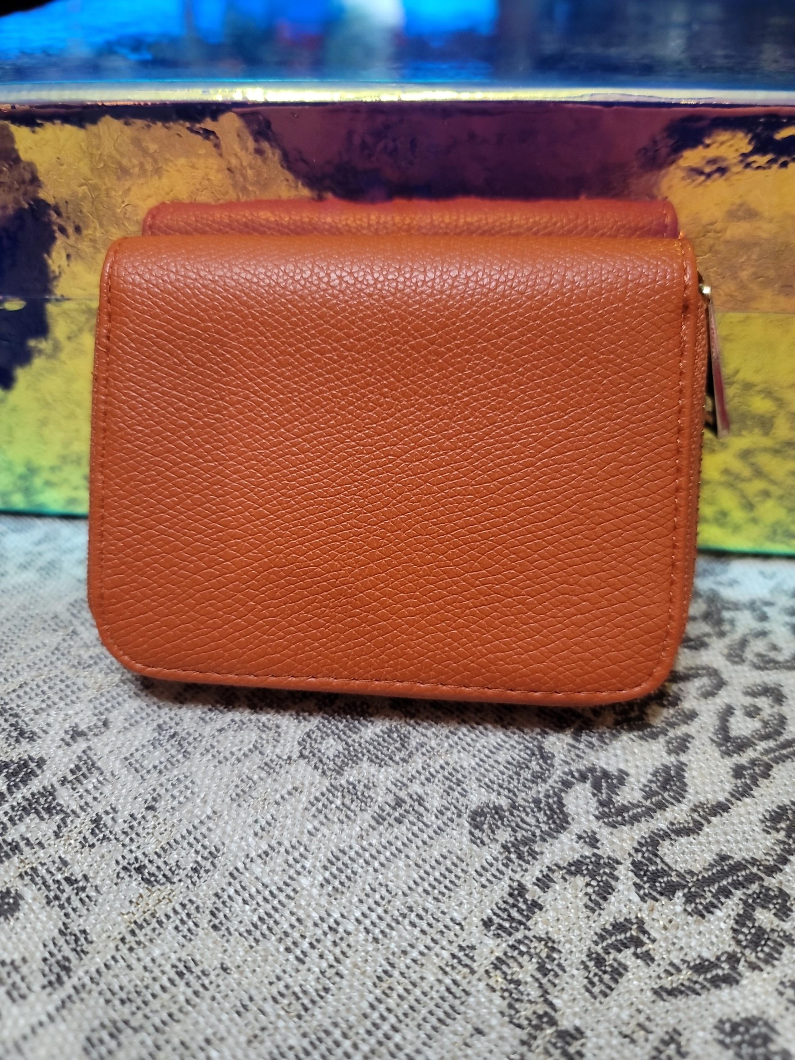 A.new.day. wallet