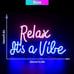 Blue and Pink relax it’s just a vibe led sign.