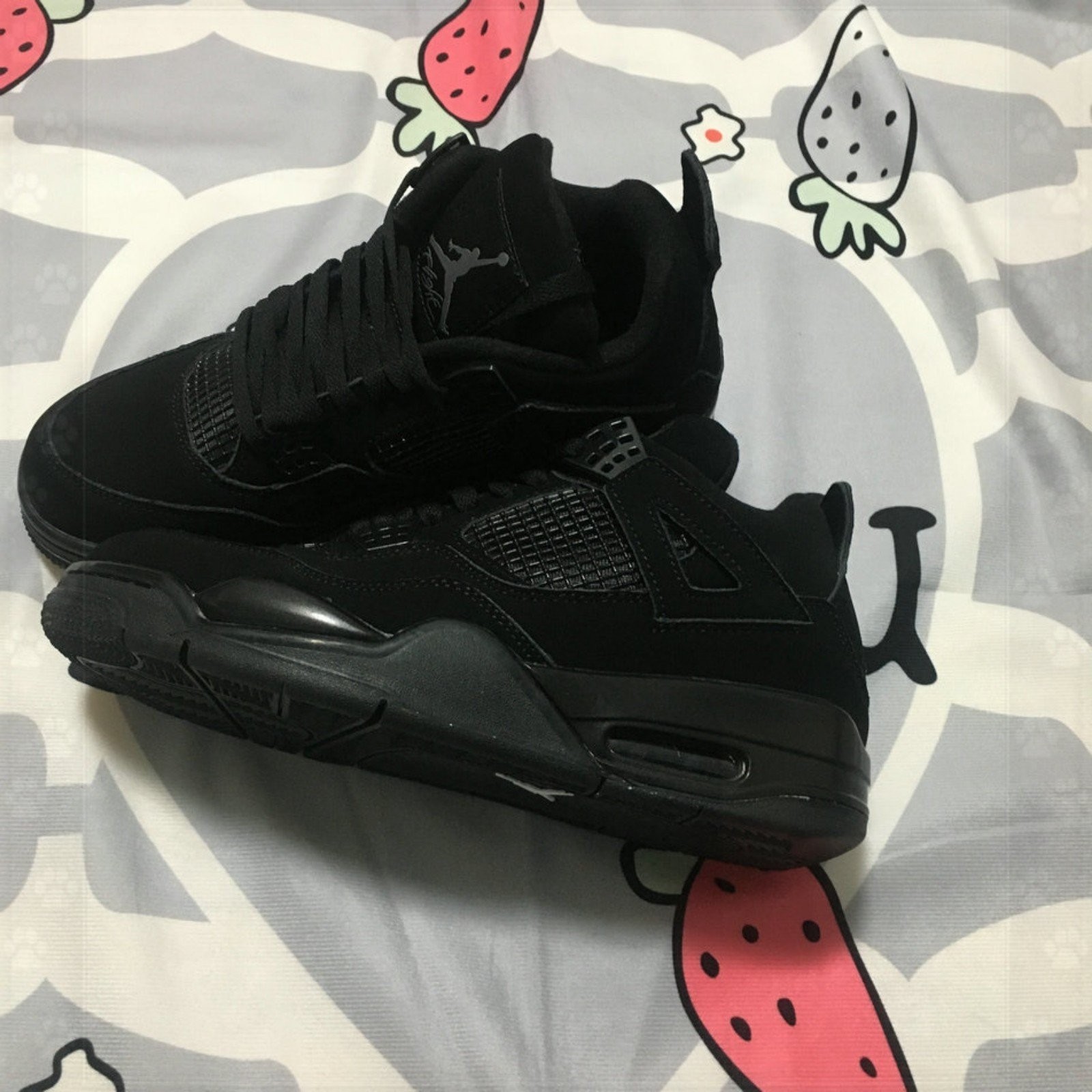 Jordan 4 black cat