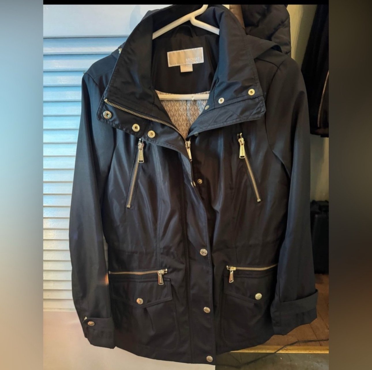 Black Michael Kors rain jacket