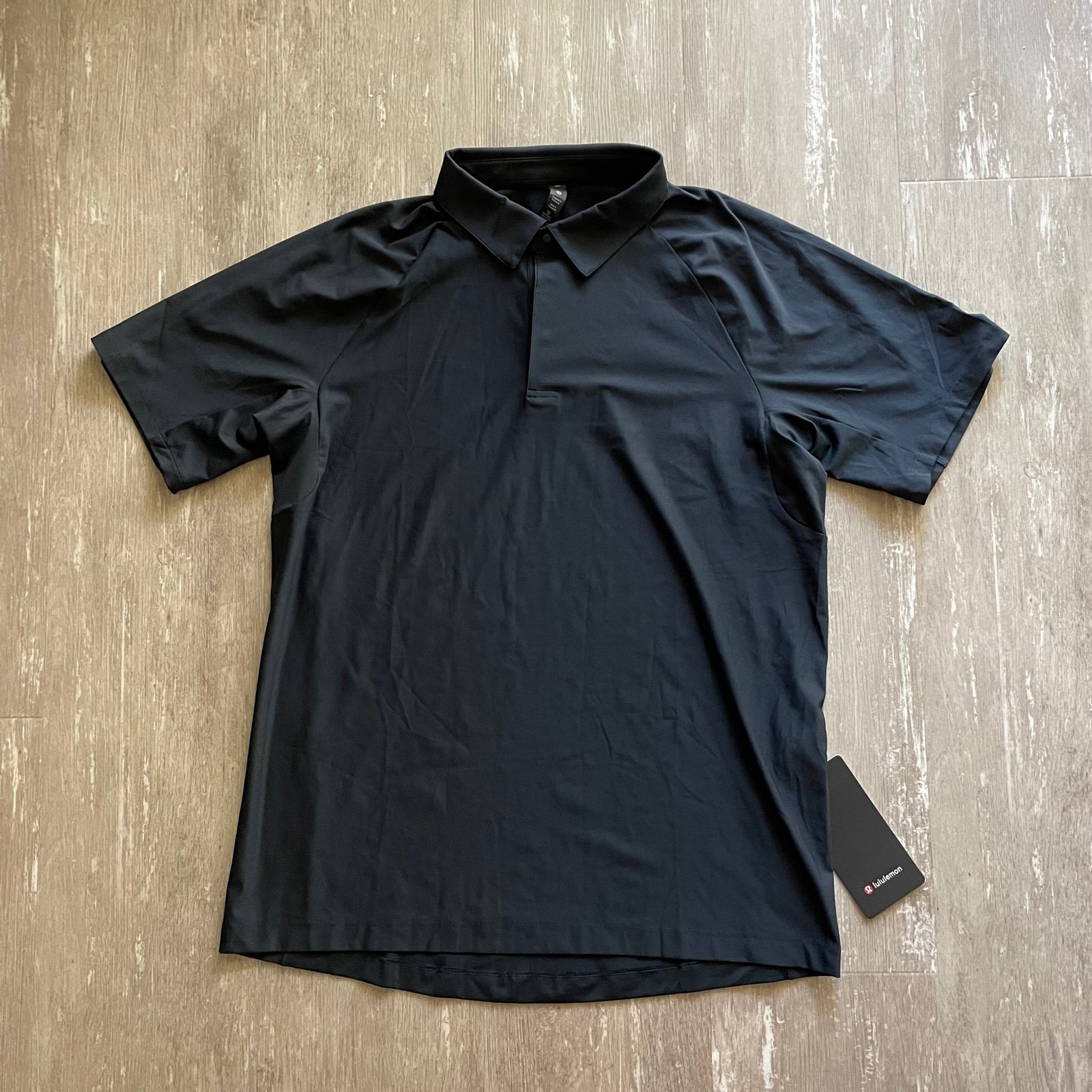 L NWT Lululemon Stretch Golf Polo Shirt in Classic Navy dark blue