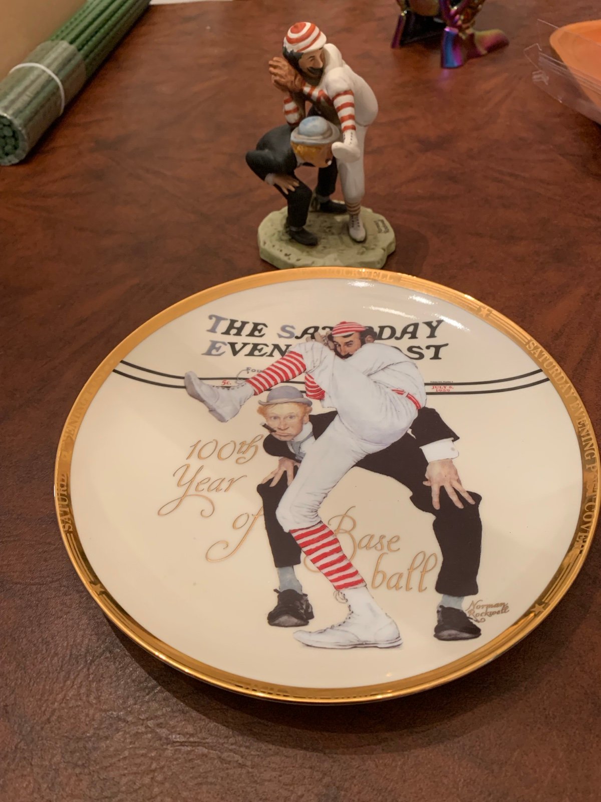 norman rockwell plate and statue