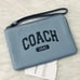 Coach Corner Zip Wristlet With Varsity