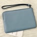 Coach Corner Zip Wristlet With Varsity