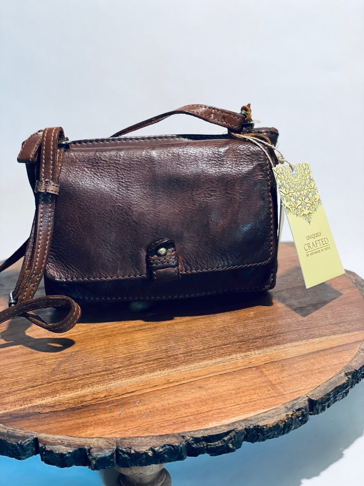 Uniquely crafted brown leather small Crossbody