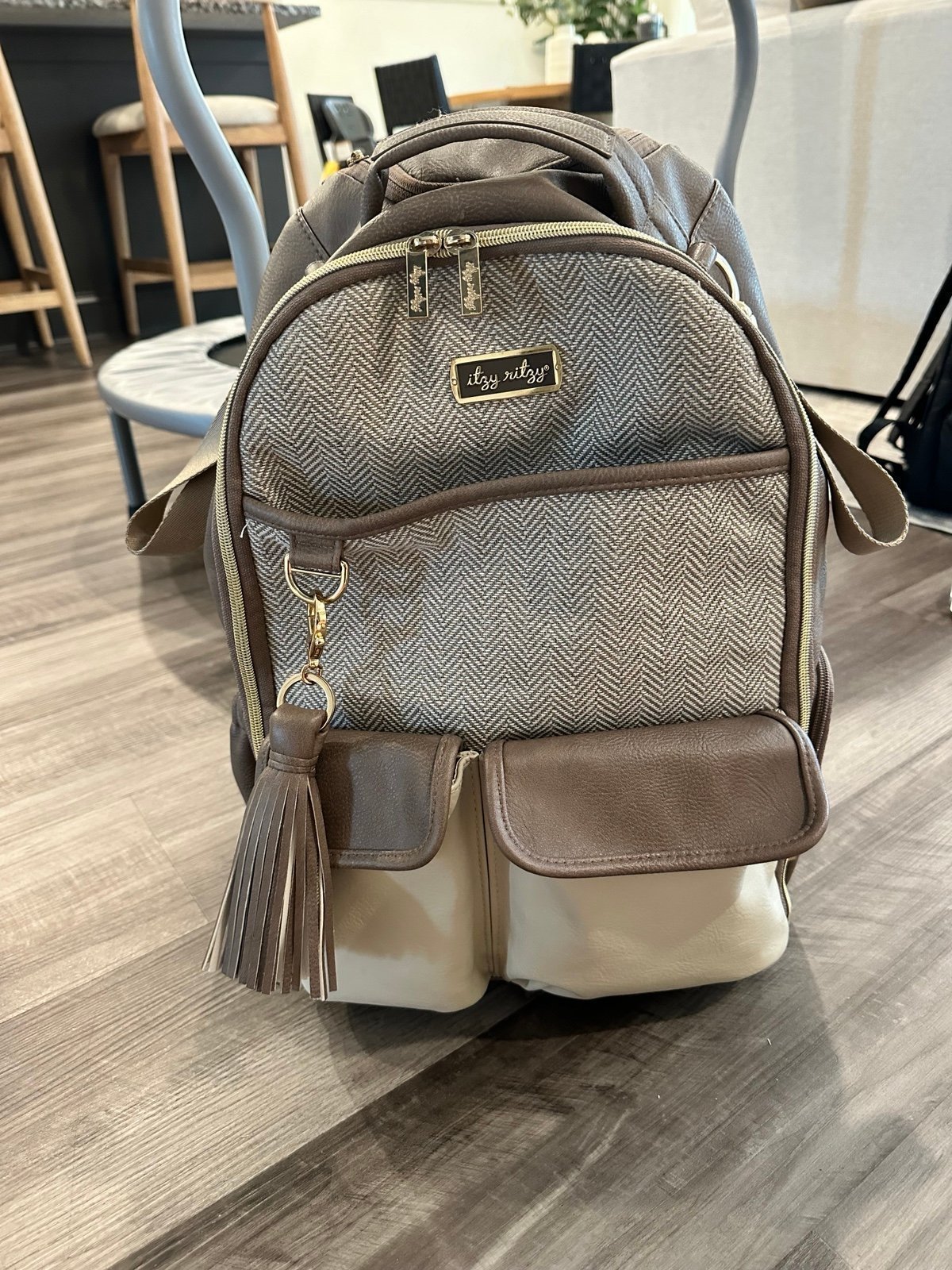 Itzy Ritzy vanilla latte diaper backpack