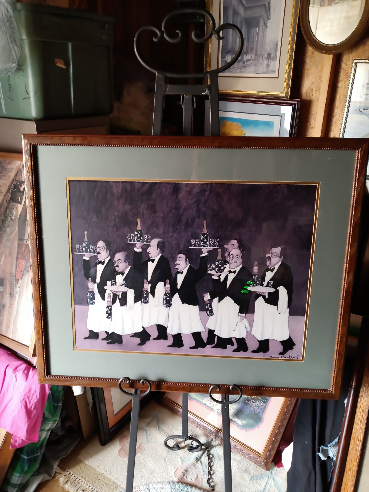 A framed print by artist Guy Buffet.