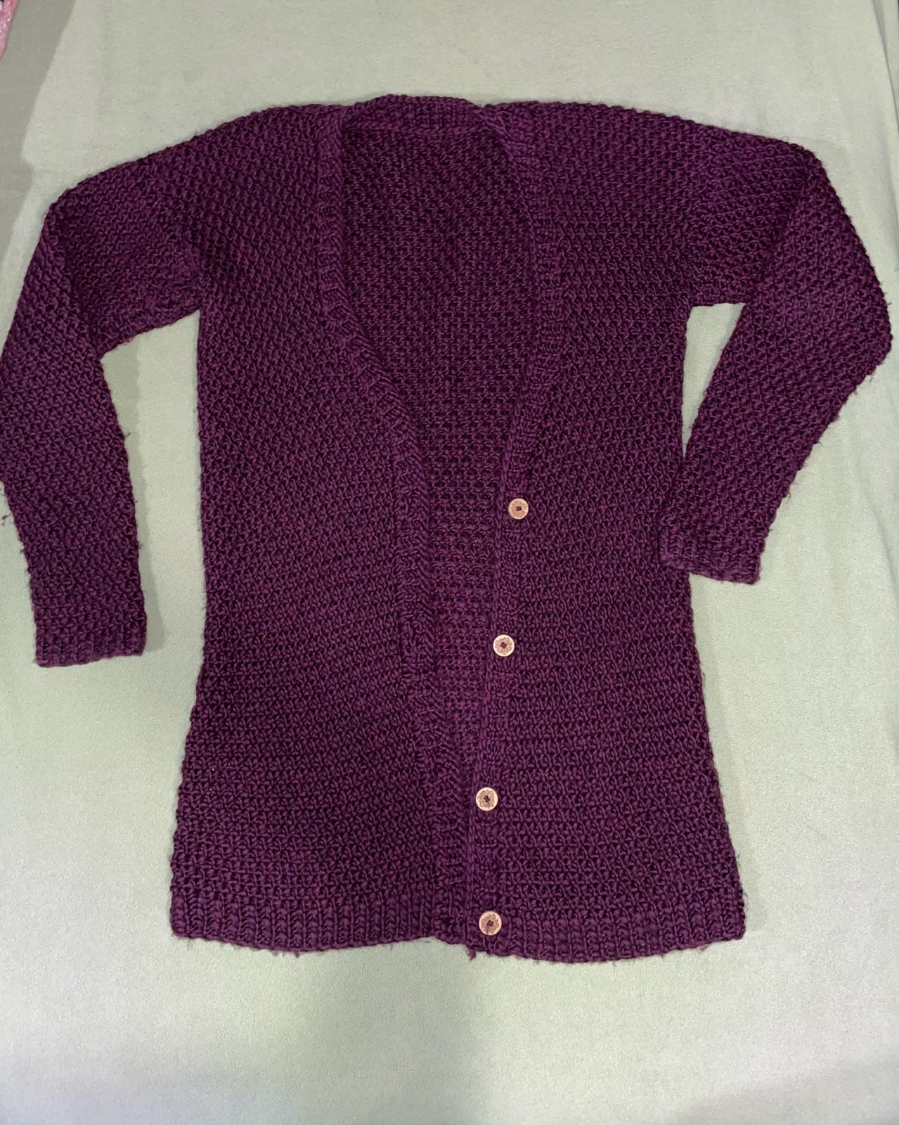 Hand knit 100% Merino Wool Cardigan size medium deep pu