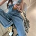 All-in-one jumpsuit overall denim pants.