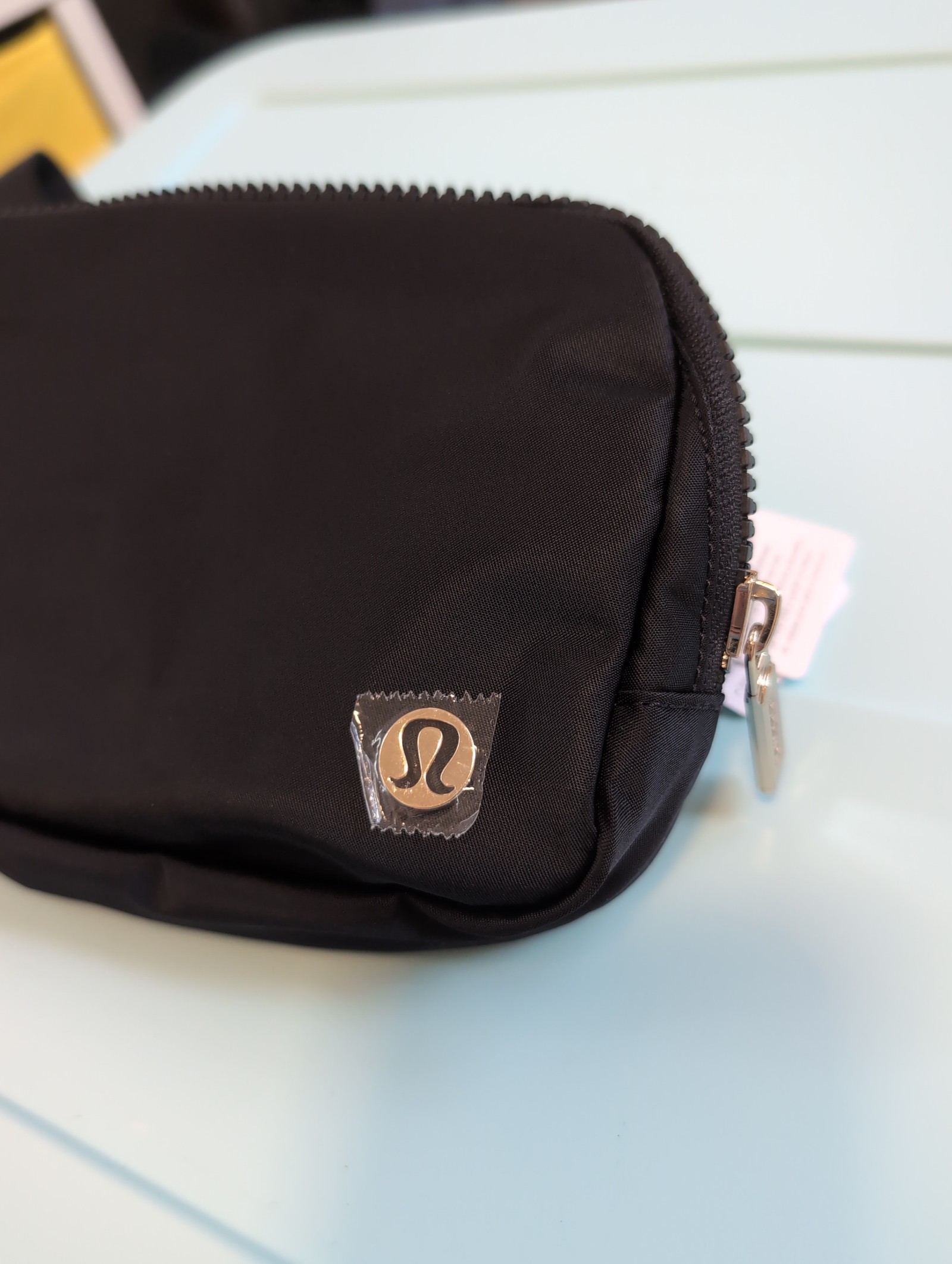Black and Gold Lululemon Everywhere Belt bag