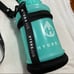 Hydrojug mint half gallon bottle w/ carrying strap harness