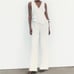 FULL LENGTH ASYMMETRIC VEST JUMPSUIT SIZE M
