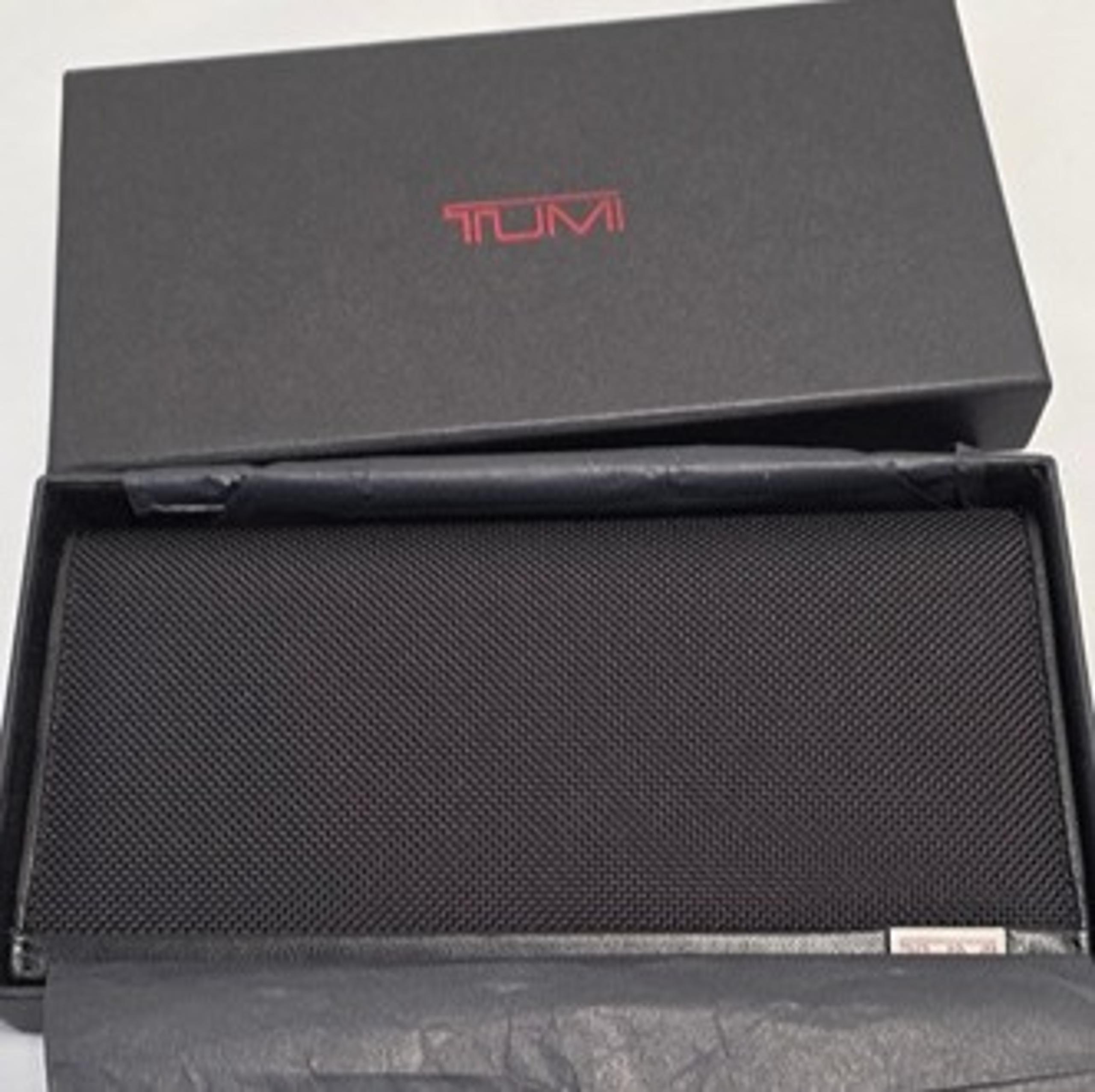 TUMI Travel Wallet from the Alpha Series - Ballistic Nylon and Black Leather