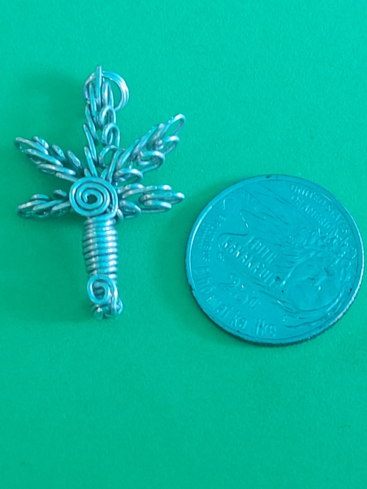 Wire wrapped pot leaf pendant