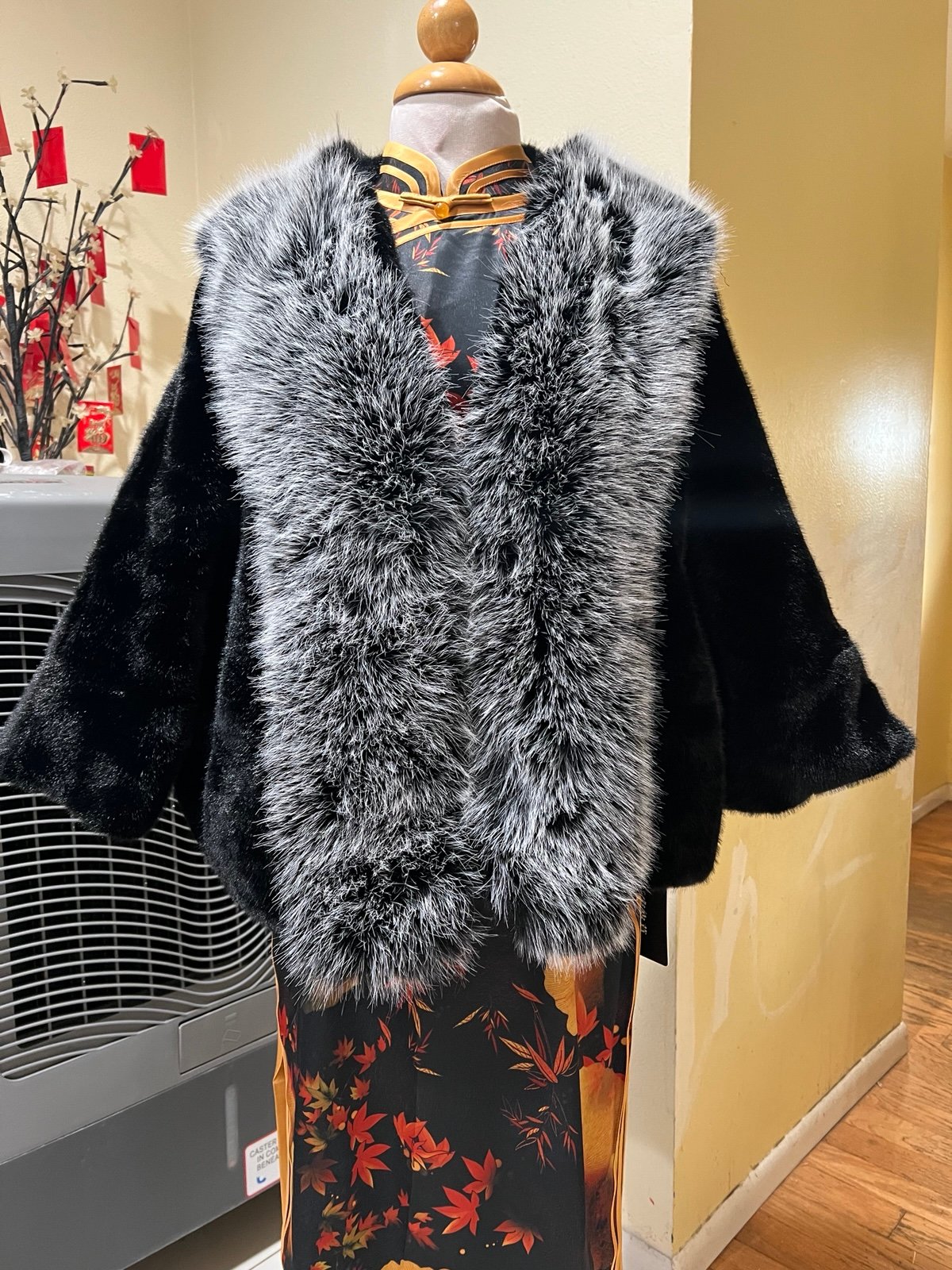 grey thicken black cape. Suitable for wearing under 140 pounds