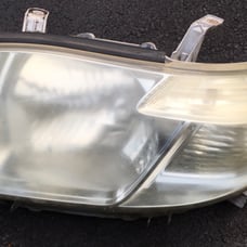 08-10 Toyota Highlander driver side Genuine headlight Assembly The lens is fo