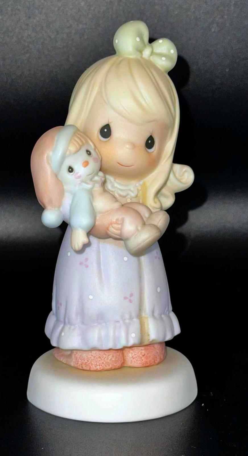 Precious Moments Figurine 'Collena' Holding A Doll