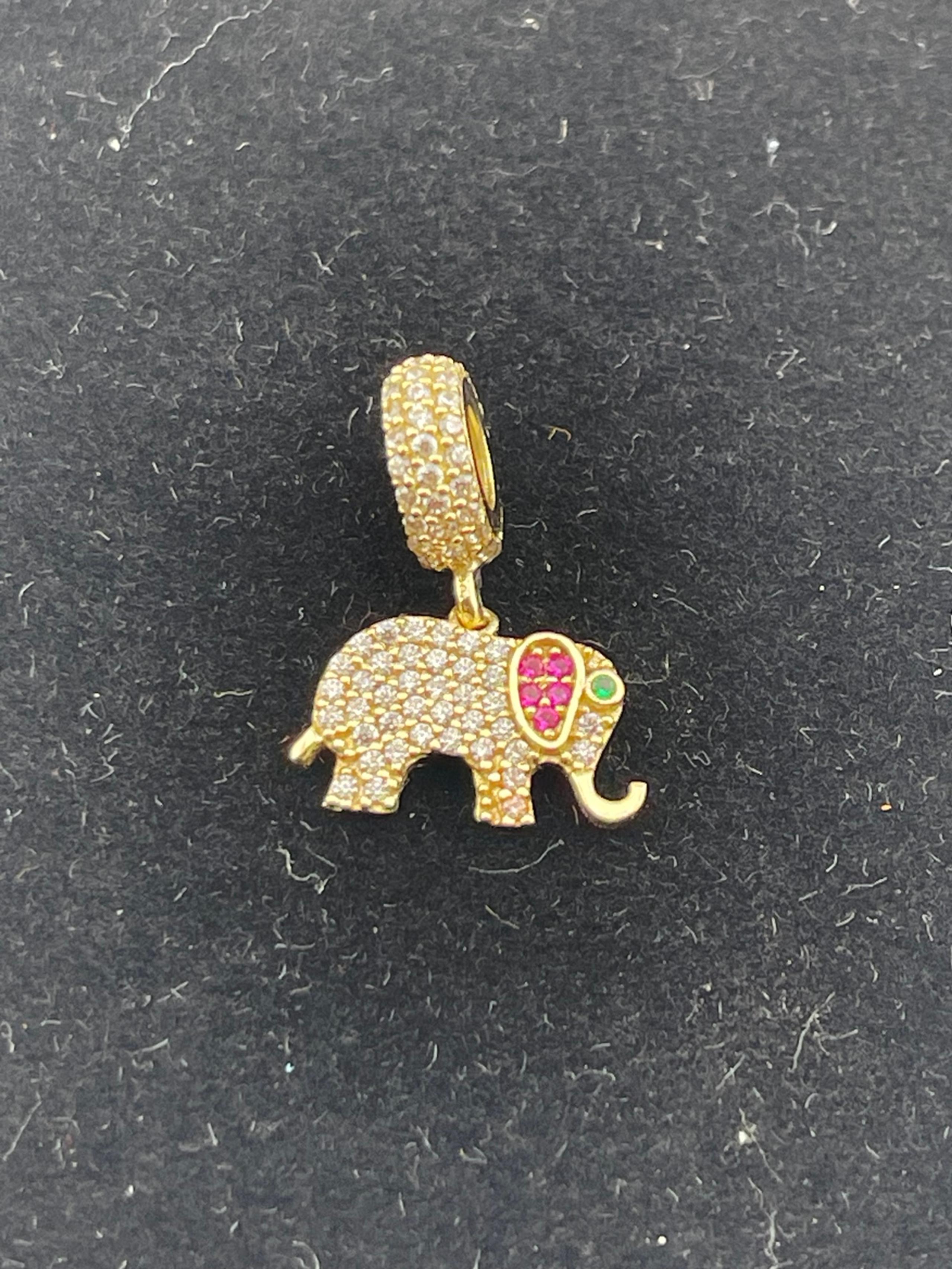 Vintage, ruby and simulated, diamond elephant pendant, 10 karat yellow gold
