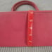 Dooney & Bourke pink/berry leather purse
