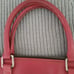 Dooney & Bourke pink/berry leather purse