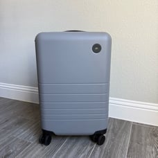 Monos expandable carry on suitcase