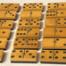 Old RARE! Butterscotch & black enrobed laminated spinner 25 dominoes 080122cDB