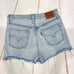 Levi’s 501 High Rise Light Wash Distressed Button Fly Cutoff Jean Shorts