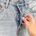 Levi’s 501 High Rise Light Wash Distressed Button Fly Cutoff Jean Shorts