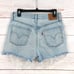 Levi’s 501 High Rise Light Wash Distressed Button Fly Cutoff Jean Shorts