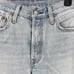 Levi’s 501 High Rise Light Wash Distressed Button Fly Cutoff Jean Shorts