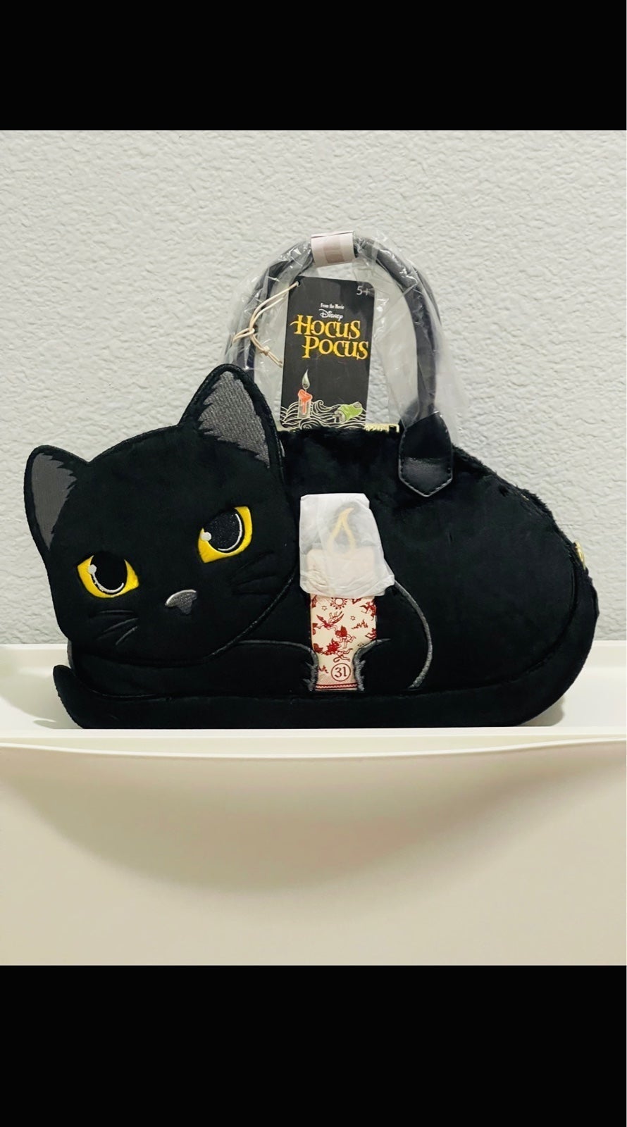 Loungefly Hocus Pocus Binx holding Candle Crossbody Bag