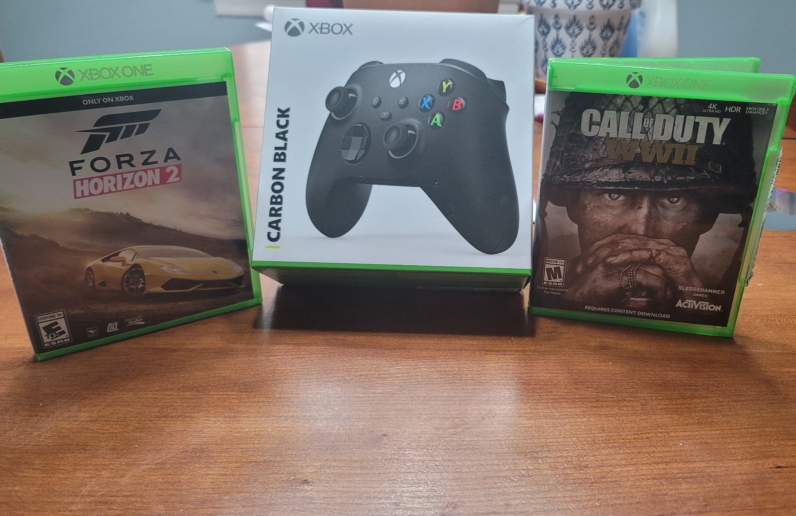 Xbox Series x controller and 2 games
