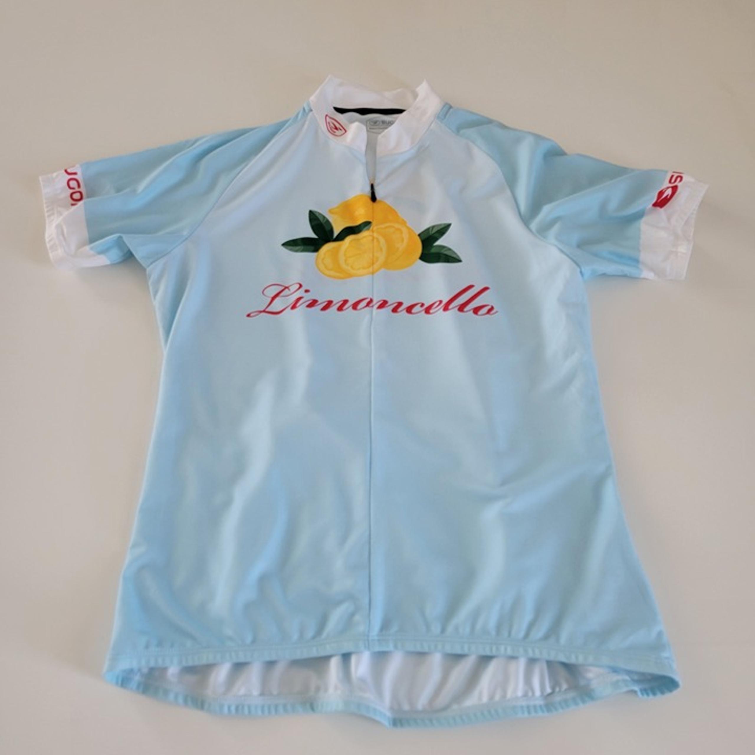 Sugoi Limoncello Cycling Jersey Size Large EUC Light Blue Quarter Zip Pockets