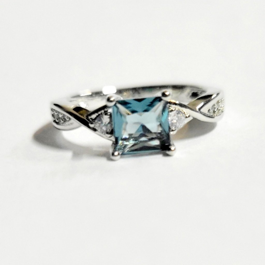 Blue cubic zirconia ring with accents size 7